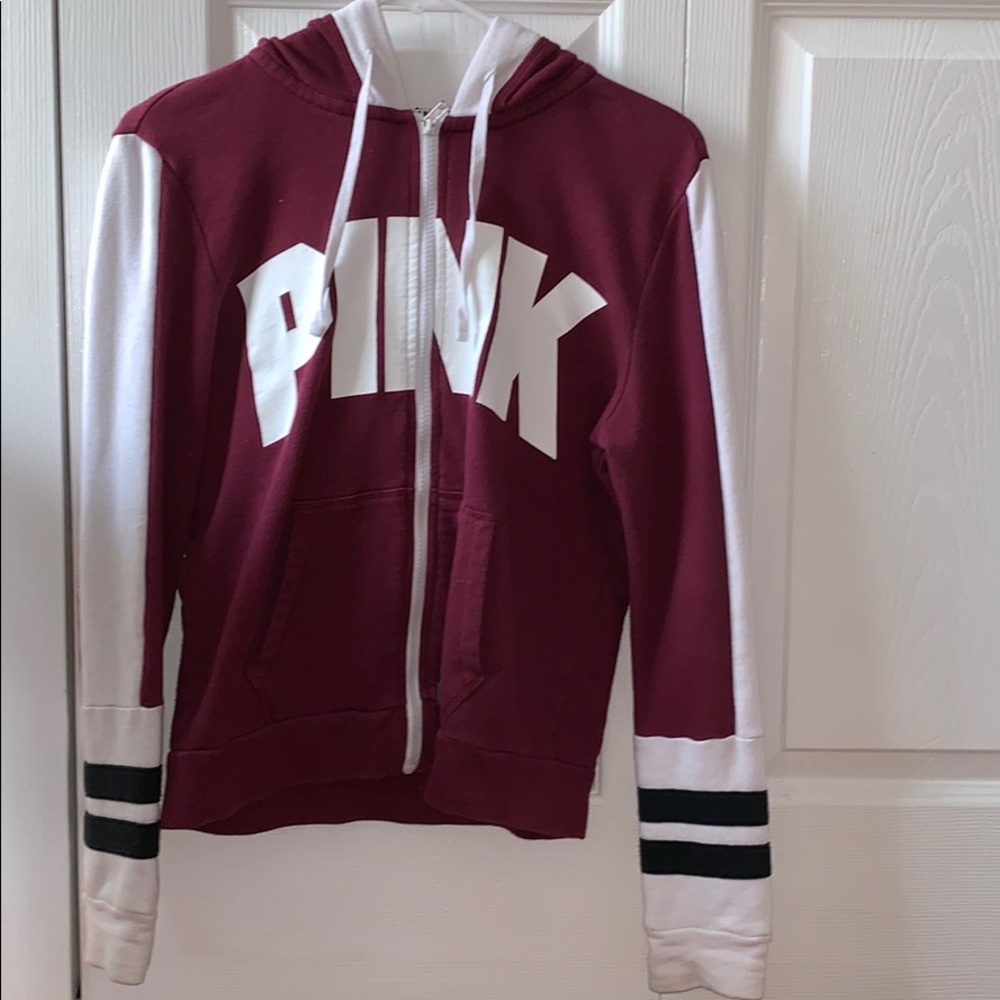 Maroon, white, and black PINK zip up jacket.